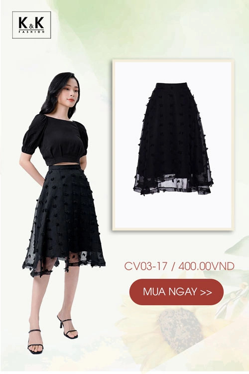 Cô gái diện chân váy xòe hoa nổi màu đen phối cùng áo croptop đen tay bồng