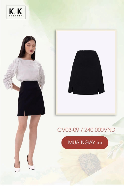 Cô gái diện chân váy đen chữ A xẻ tà phối cùng áo sơ mi trắng tay bồng cách điệu