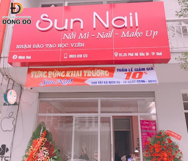 Băng rôn khai trương tiệm Sun Nail với gam màu tươi sáng, dễ chịu