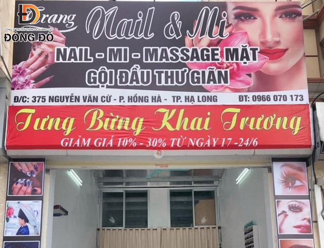 Mẫu băng rôn khai trương shop nail màu đỏ rực với ưu đãi giảm giá hấp dẫn