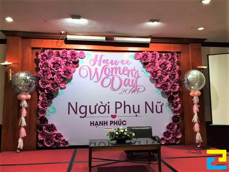 Mẫu backdrop kỷ niệm ngày Quốc tế Phụ nữ với tông màu hồng nhẹ nhàng và thiết kế tinh tế
