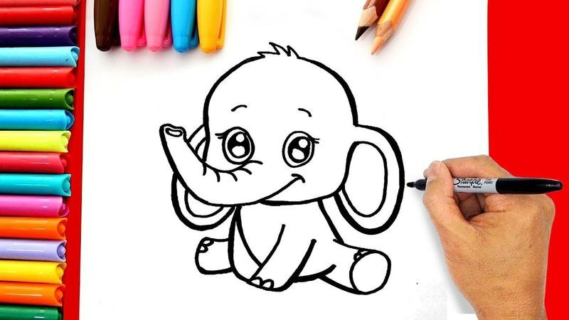 Bé đang tập tô màu chú voi trong không gian học tập vui vẻ